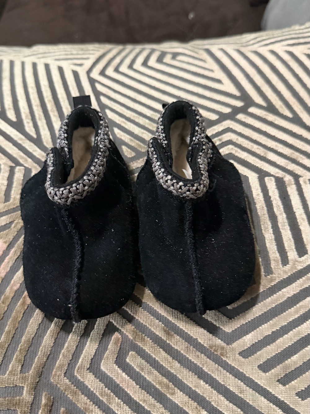 UGG Black Cozy Slip-On Kids Booties with Braided Trim